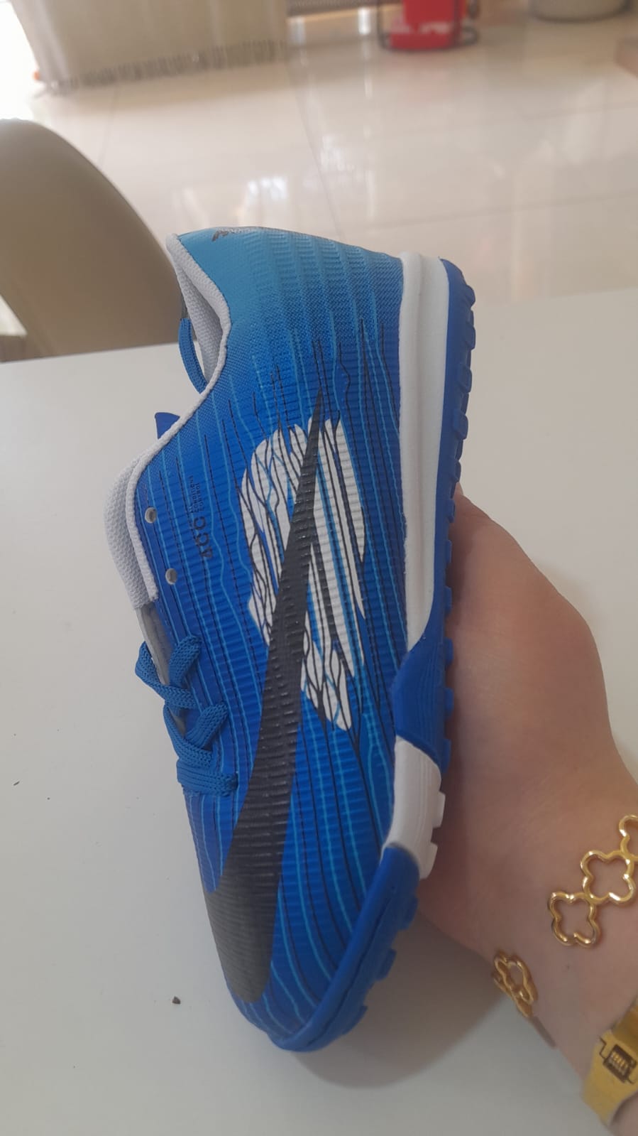 Nike kids blue turf football shoes ribbed upper white swoosh