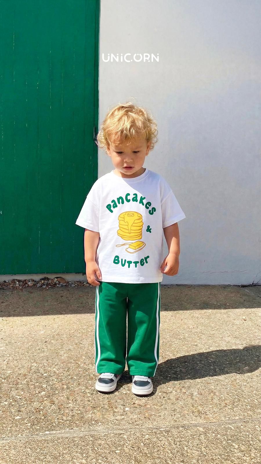 Unisex Cotton Set Featuring a White T-shirt with a Pancake Graphic and Green Track Pants with White Stripes