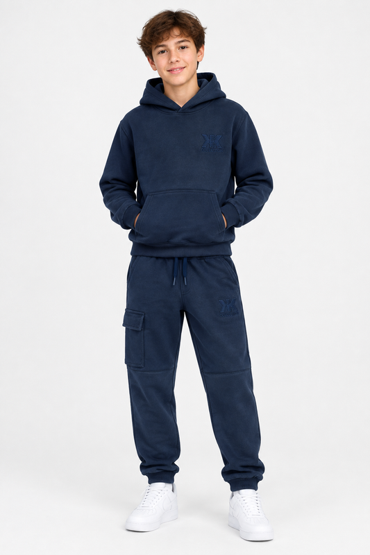 13-year-old boy wearing the navy hoodie and cargo jogger set