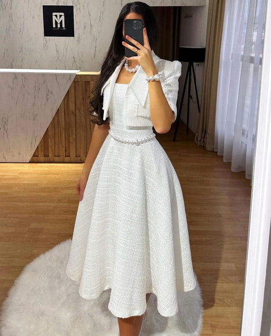 Tweed Chanel Suit with Cropped Jacket image 0