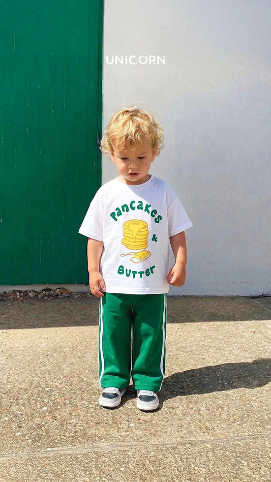 Unisex Cotton Set Featuring a White T-shirt with a Pancake Graphic and Green Track Pants with White Stripes