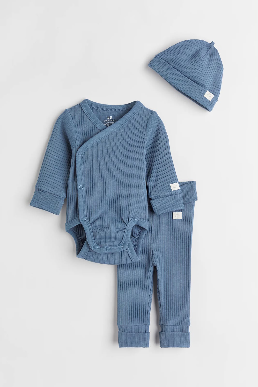 Blue ribbed baby set with wrap bodysuit, pants, and beanie