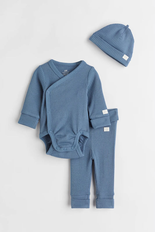 Blue ribbed baby set with wrap bodysuit, pants, and beanie