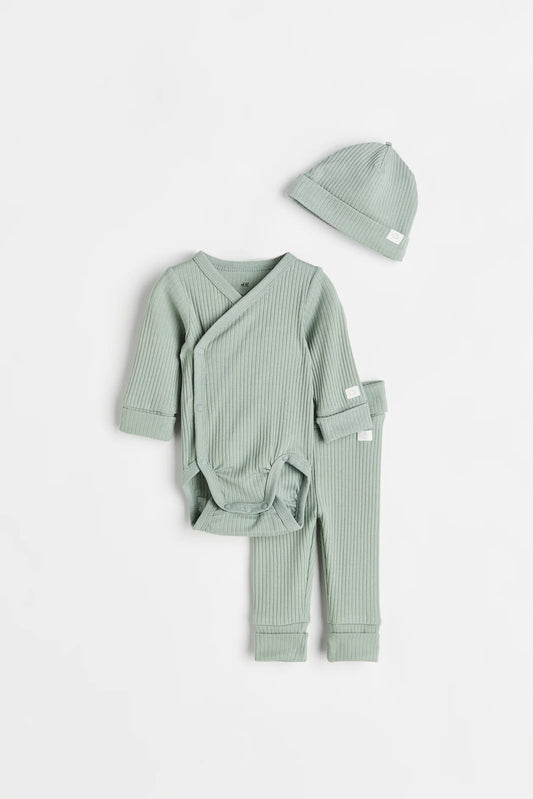 Sage green ribbed newborn set with wrap bodysuit, pants, and beanie