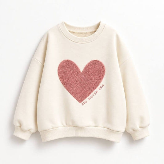 Cream kids sweatshirt with a large textured pink heart on the front