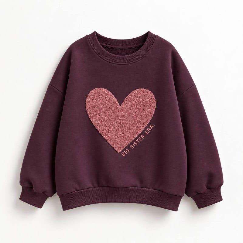Burgundy kids sweatshirt with textured pink heart and Big Sister Era lettering