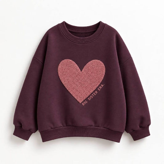 Burgundy kids sweatshirt with textured pink heart and Big Sister Era lettering