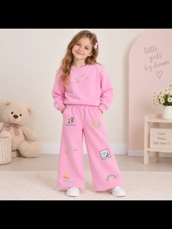 Girls' pink graphic sweatshirt and matching wide-leg pants with colourful flower and rainbow motifs