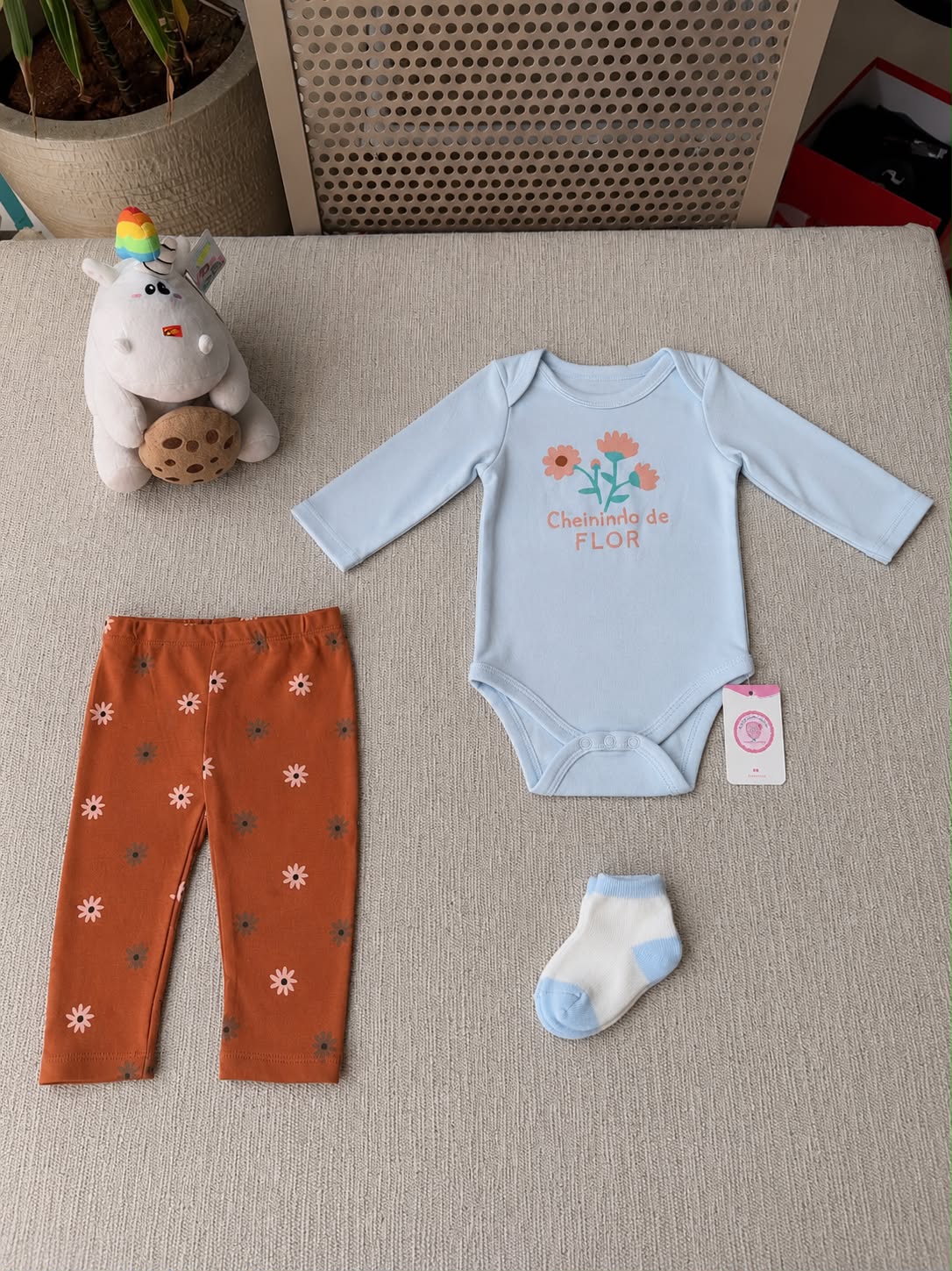 Original blue floral bodysuit and rust pants baby set