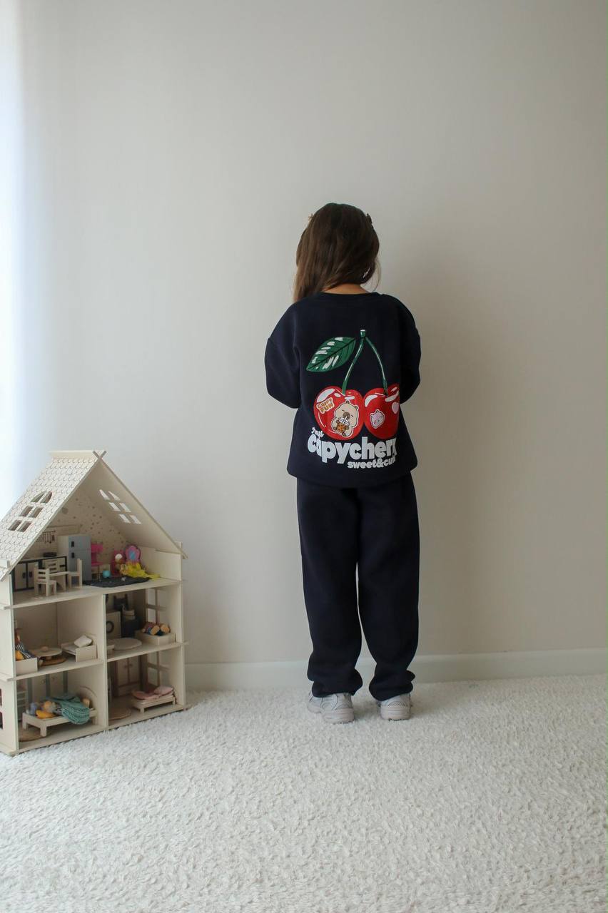 Back view of girls’ black cherry-print sweatshirt and jogger set