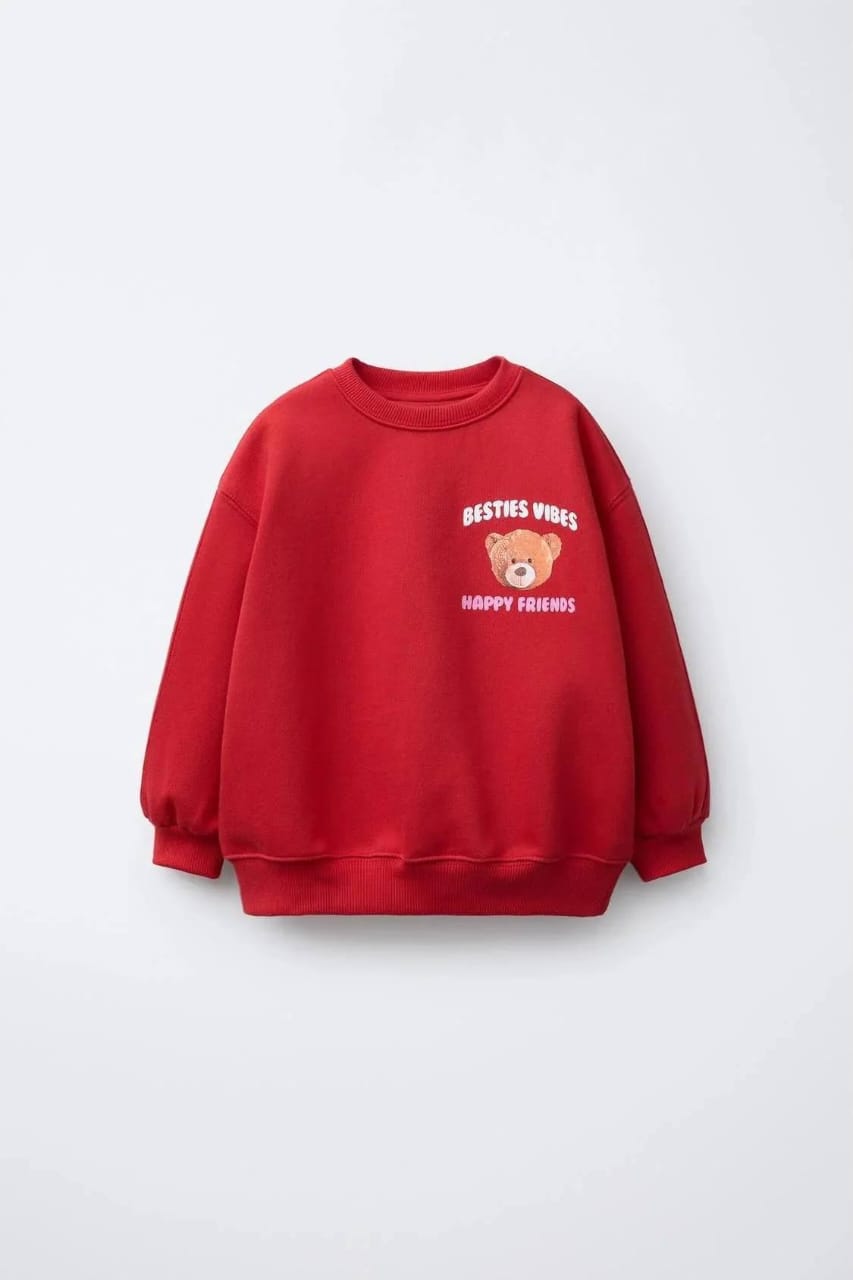 Child wearing the red Besties Vibes teddy-bear sweatshirt