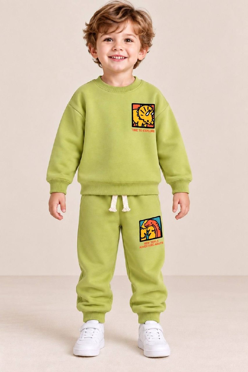 Child wearing a lime green graphic sweatshirt and matching joggers with white drawstring detail.