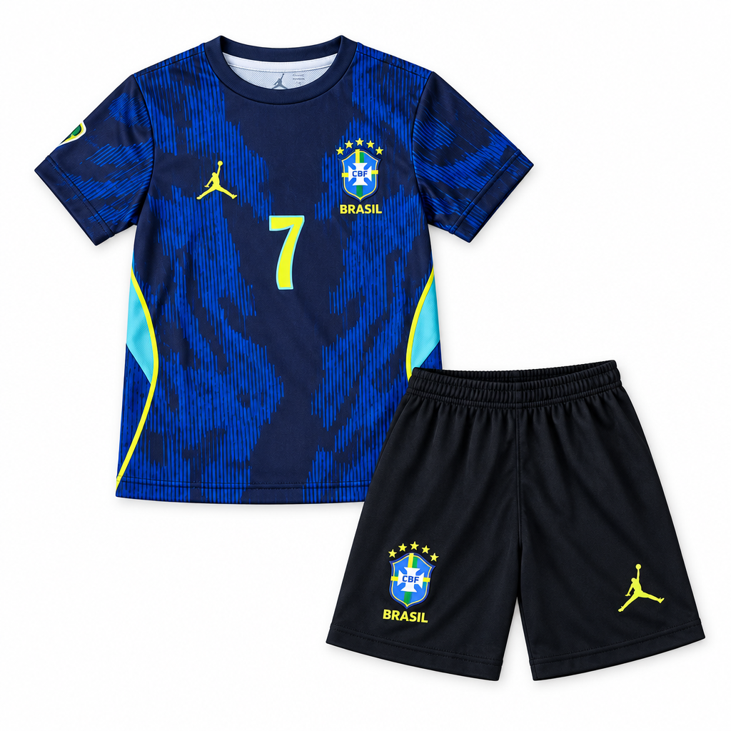 Navy and electric-blue youth football jersey with matching black shorts on a white studio background