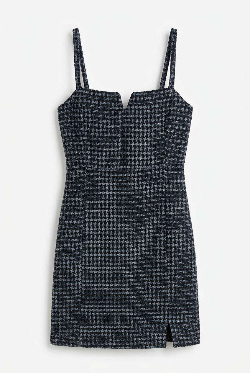 Front studio view of dark woven strappy dress on a white background