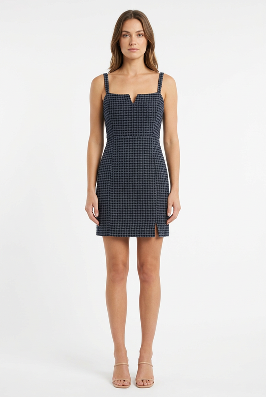 Adult woman modeling the dark woven strappy dress