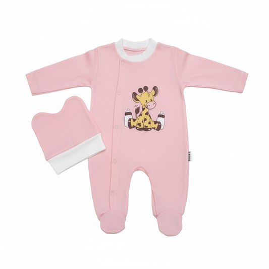 Pink baby giraffe sleepsuit with matching hat on white background