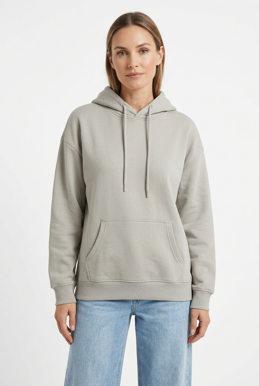 Stone-gray hoodie styled on a woman model with light-wash jeans against a white background